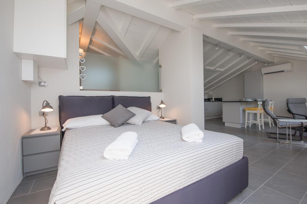 Il Pontile Apartment Беладжо Екстериор снимка